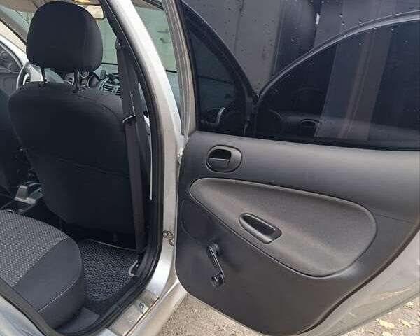 Сірий Пежо 206, об'ємом двигуна 1.4 л та пробігом 197 тис. км за 4699 $, фото 6 на Automoto.ua