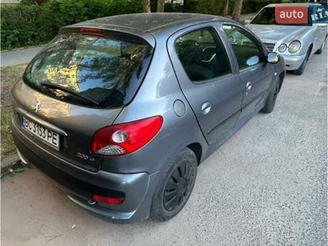 Серый Пежо 206, объемом двигателя 1.4 л и пробегом 228 тыс. км за 3700 $, фото 8 на Automoto.ua