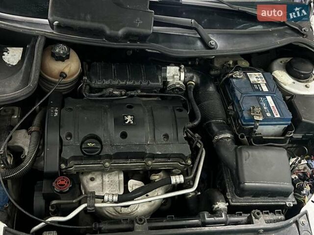Сірий Пежо 206, об'ємом двигуна 1.59 л та пробігом 181 тис. км за 4000 $, фото 6 на Automoto.ua