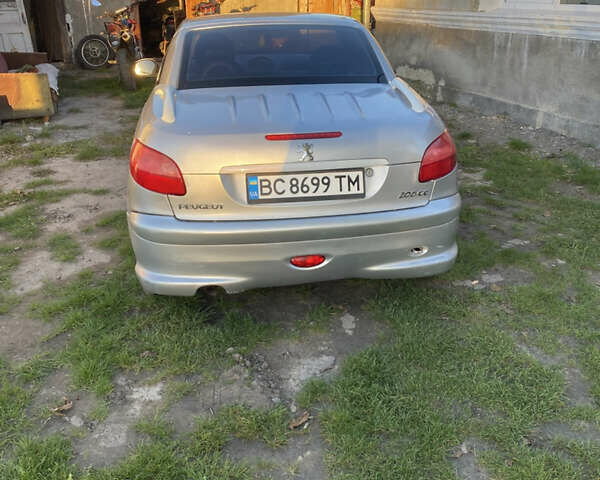 Серый Пежо 206, объемом двигателя 1.59 л и пробегом 172 тыс. км за 2999 $, фото 4 на Automoto.ua