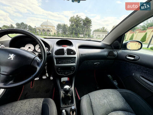Серый Пежо 206, объемом двигателя 1.6 л и пробегом 214 тыс. км за 4200 $, фото 15 на Automoto.ua