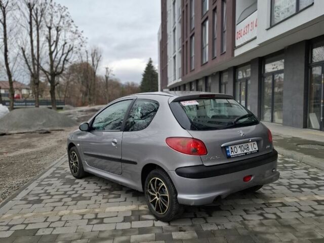 Серый Пежо 206, объемом двигателя 1.1 л и пробегом 128 тыс. км за 2500 $, фото 2 на Automoto.ua