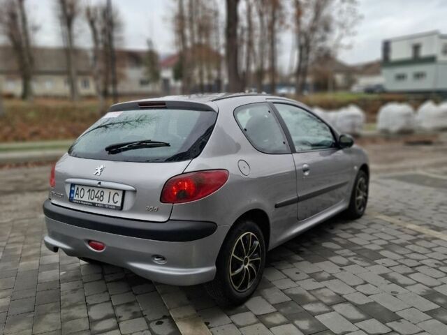 Серый Пежо 206, объемом двигателя 1.1 л и пробегом 128 тыс. км за 2500 $, фото 3 на Automoto.ua