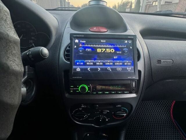 Серый Пежо 206, объемом двигателя 1.4 л и пробегом 185 тыс. км за 4000 $, фото 6 на Automoto.ua