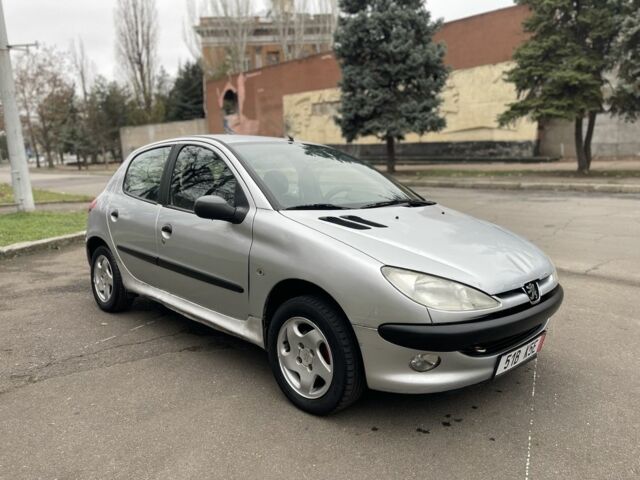 Серый Пежо 206, объемом двигателя 1.9 л и пробегом 220 тыс. км за 1299 $, фото 5 на Automoto.ua