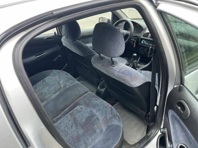 Серый Пежо 206, объемом двигателя 1.9 л и пробегом 220 тыс. км за 1299 $, фото 13 на Automoto.ua