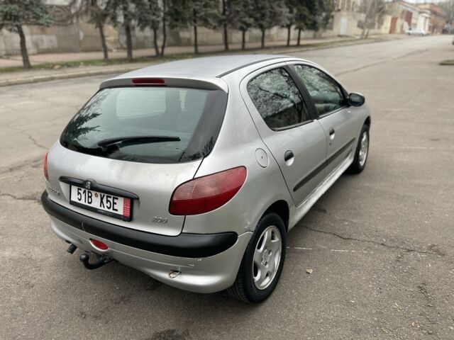 Серый Пежо 206, объемом двигателя 1.9 л и пробегом 220 тыс. км за 1299 $, фото 4 на Automoto.ua