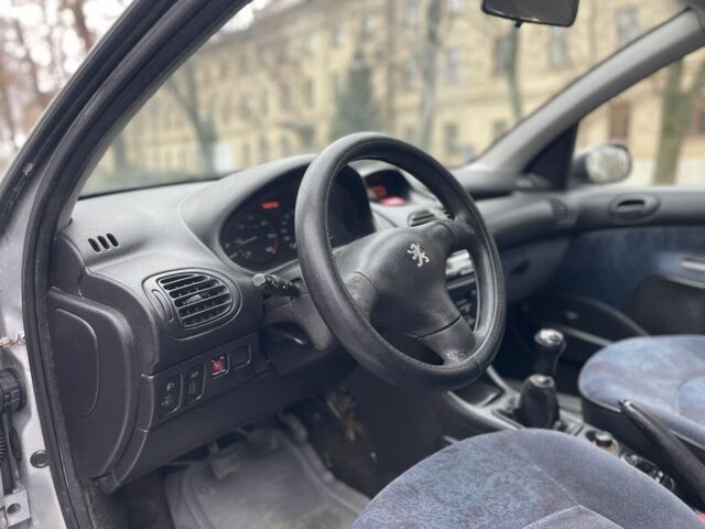 Серый Пежо 206, объемом двигателя 1.9 л и пробегом 220 тыс. км за 1299 $, фото 11 на Automoto.ua