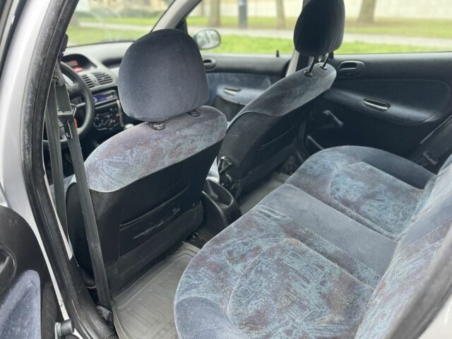 Серый Пежо 206, объемом двигателя 1.9 л и пробегом 220 тыс. км за 1299 $, фото 15 на Automoto.ua