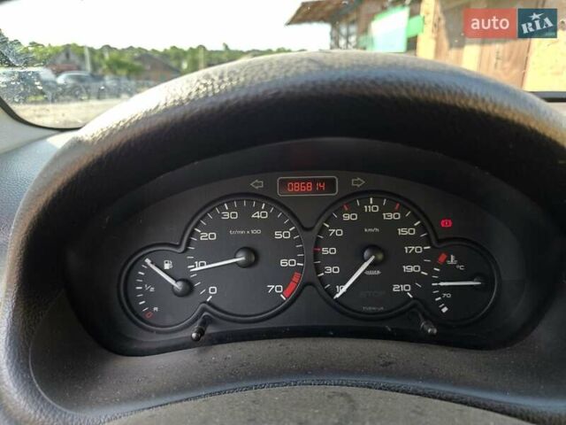 Сірий Пежо 206, об'ємом двигуна 1.36 л та пробігом 87 тис. км за 3000 $, фото 1 на Automoto.ua