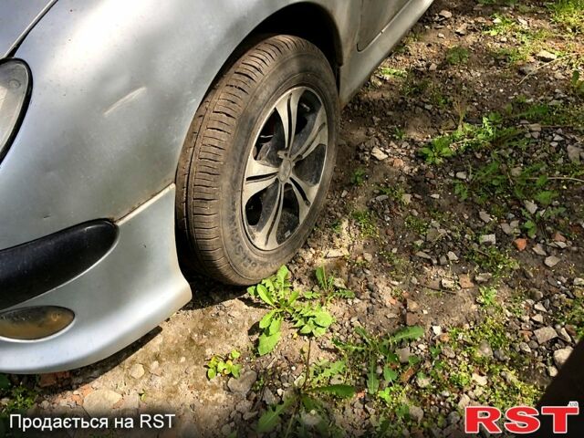 Сірий Пежо 206, об'ємом двигуна 1.4 л та пробігом 160 тис. км за 1300 $, фото 1 на Automoto.ua