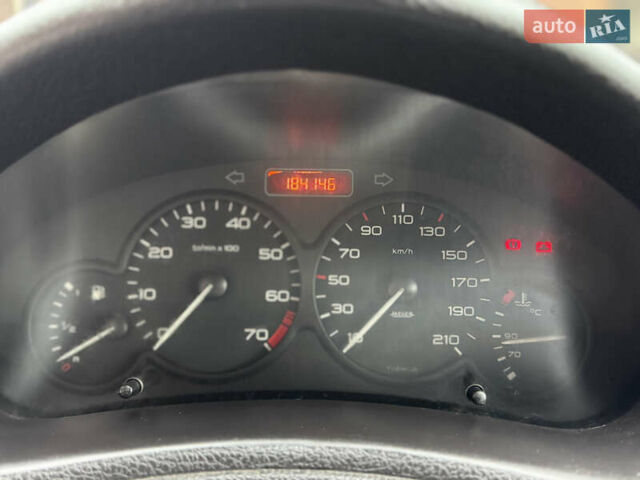 Серый Пежо 206, объемом двигателя 1.36 л и пробегом 184 тыс. км за 2300 $, фото 8 на Automoto.ua