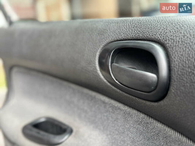 Серый Пежо 206, объемом двигателя 1.36 л и пробегом 184 тыс. км за 2300 $, фото 14 на Automoto.ua