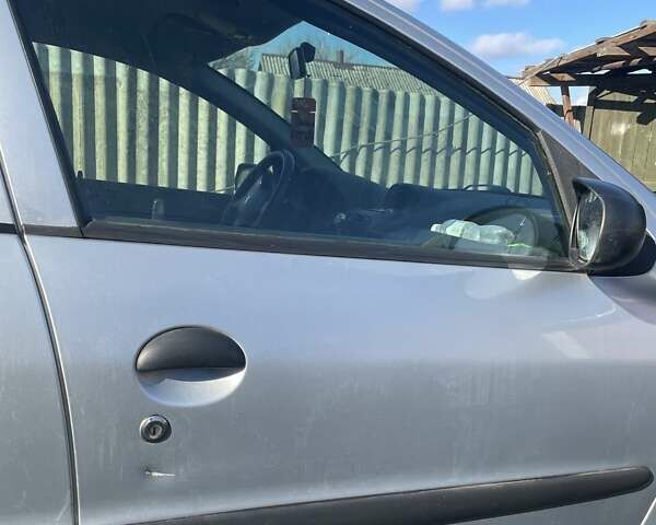 Серый Пежо 206, объемом двигателя 1.36 л и пробегом 150 тыс. км за 3500 $, фото 24 на Automoto.ua