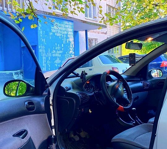 Серый Пежо 206, объемом двигателя 1.4 л и пробегом 116 тыс. км за 3499 $, фото 8 на Automoto.ua