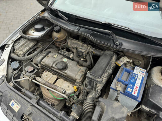 Серый Пежо 206, объемом двигателя 1.36 л и пробегом 184 тыс. км за 2100 $, фото 14 на Automoto.ua