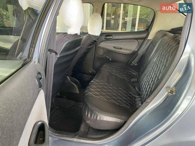 Сірий Пежо 206, об'ємом двигуна 1.36 л та пробігом 245 тис. км за 4499 $, фото 10 на Automoto.ua