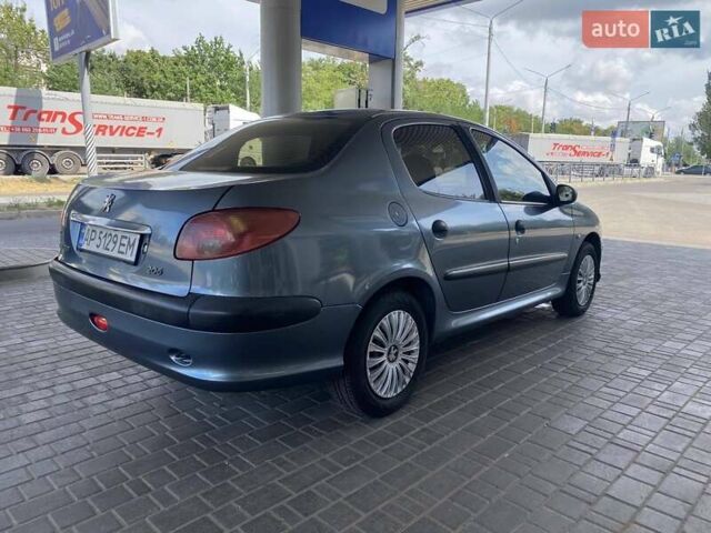 Сірий Пежо 206, об'ємом двигуна 1.36 л та пробігом 245 тис. км за 4499 $, фото 4 на Automoto.ua