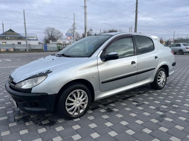 Серый Пежо 206, объемом двигателя 1.4 л и пробегом 250 тыс. км за 1900 $, фото 18 на Automoto.ua