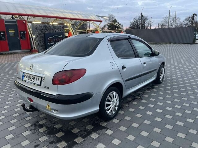 Серый Пежо 206, объемом двигателя 1.4 л и пробегом 250 тыс. км за 1900 $, фото 4 на Automoto.ua