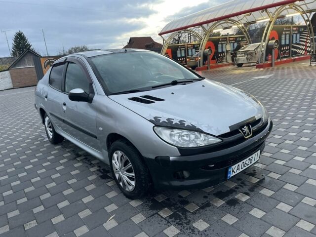 Серый Пежо 206, объемом двигателя 1.4 л и пробегом 250 тыс. км за 1900 $, фото 8 на Automoto.ua