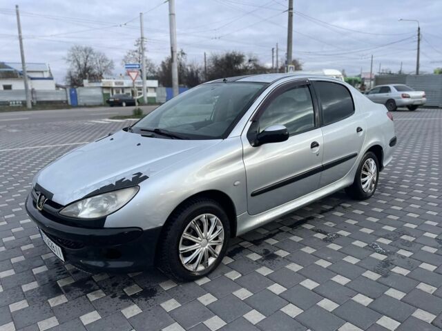 Серый Пежо 206, объемом двигателя 1.4 л и пробегом 250 тыс. км за 1900 $, фото 9 на Automoto.ua