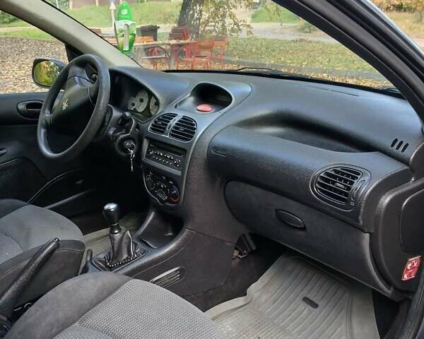 Пежо 206 2008 в Золочев на Automoto.ua Серый Пежо 206, объемом двигателя 1.36 л и пробегом 268 тыс. км за 3000 $, фото 10 на Automoto.ua
