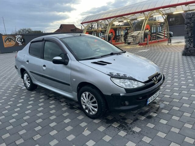 Серый Пежо 206, объемом двигателя 1.4 л и пробегом 250 тыс. км за 1900 $, фото 7 на Automoto.ua