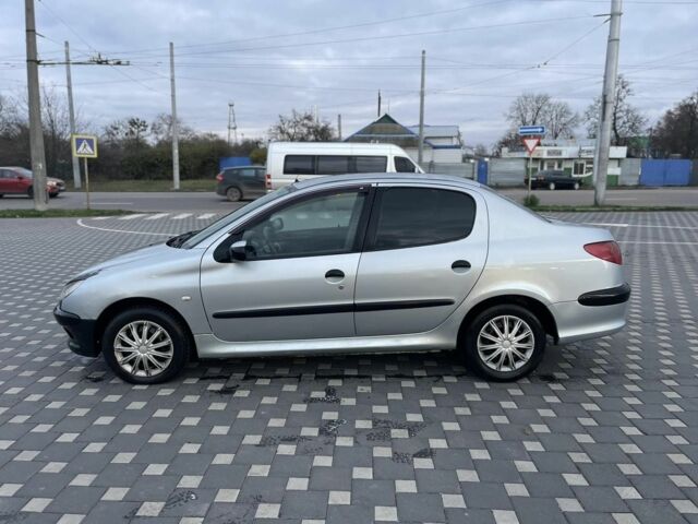 Серый Пежо 206, объемом двигателя 1.4 л и пробегом 250 тыс. км за 1900 $, фото 1 на Automoto.ua