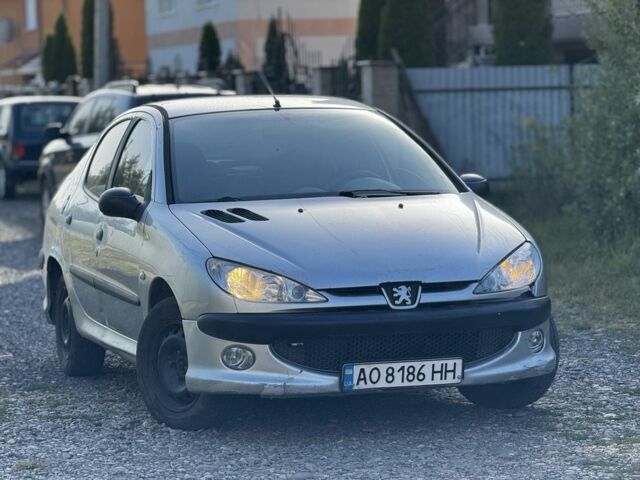 Серый Пежо 206, объемом двигателя 1.4 л и пробегом 350 тыс. км за 1350 $, фото 1 на Automoto.ua