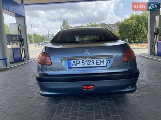 Сірий Пежо 206, об'ємом двигуна 1.36 л та пробігом 245 тис. км за 4499 $, фото 5 на Automoto.ua