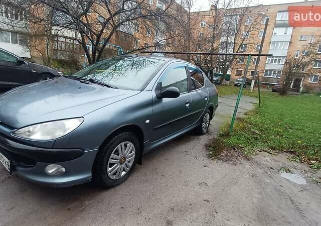 Серый Пежо 206, объемом двигателя 1.36 л и пробегом 234 тыс. км за 3000 $, фото 13 на Automoto.ua