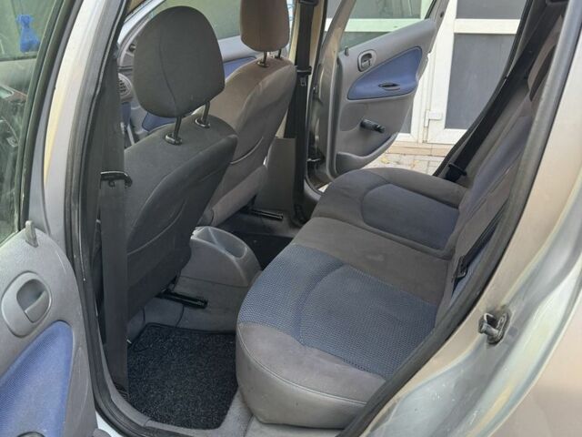 Серый Пежо 206, объемом двигателя 1.4 л и пробегом 202 тыс. км за 2499 $, фото 7 на Automoto.ua