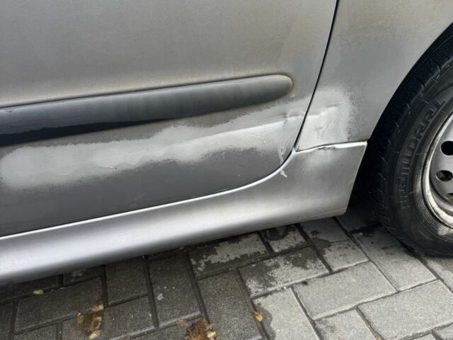 Серый Пежо 206, объемом двигателя 1.4 л и пробегом 202 тыс. км за 2499 $, фото 2 на Automoto.ua