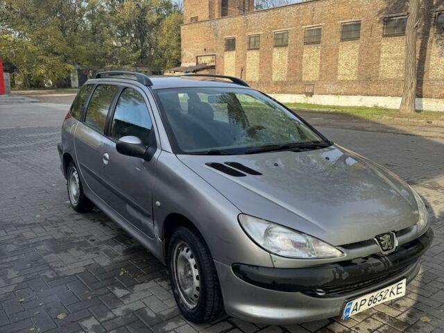 Серый Пежо 206, объемом двигателя 1.4 л и пробегом 202 тыс. км за 2499 $, фото 3 на Automoto.ua