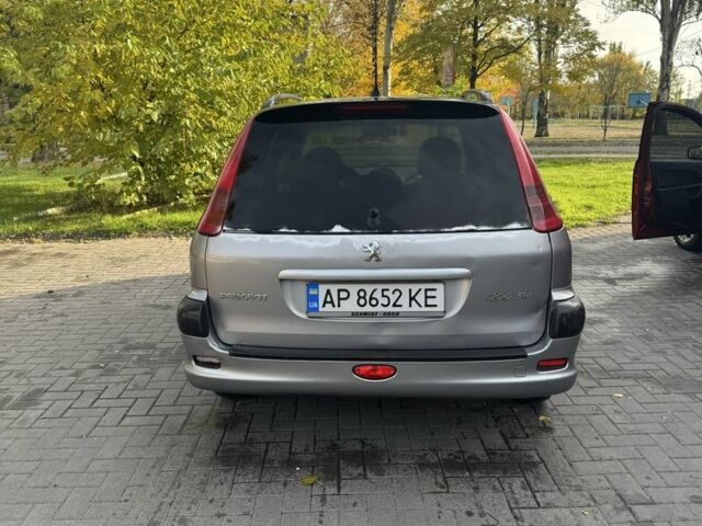 Серый Пежо 206, объемом двигателя 1.4 л и пробегом 202 тыс. км за 2499 $, фото 1 на Automoto.ua