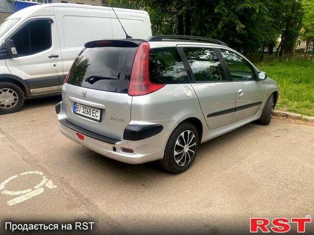 Серый Пежо 206, объемом двигателя 2 л и пробегом 300 тыс. км за 2800 $, фото 1 на Automoto.ua