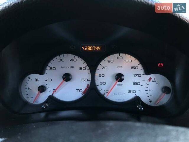 Серый Пежо 206, объемом двигателя 1.4 л и пробегом 280 тыс. км за 3300 $, фото 4 на Automoto.ua