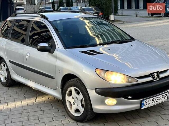 Серый Пежо 206, объемом двигателя 1.4 л и пробегом 319 тыс. км за 3100 $, фото 3 на Automoto.ua