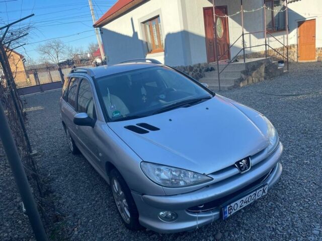 Серый Пежо 206, объемом двигателя 1.6 л и пробегом 274 тыс. км за 2300 $, фото 1 на Automoto.ua