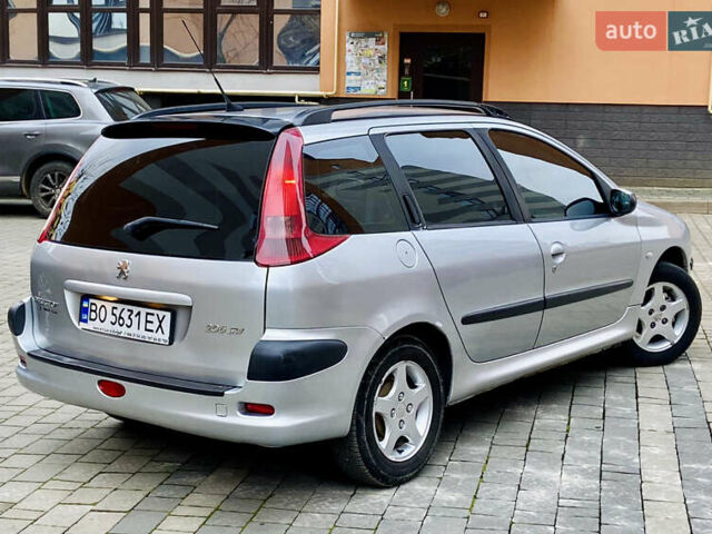 Серый Пежо 206, объемом двигателя 1.4 л и пробегом 260 тыс. км за 2850 $, фото 10 на Automoto.ua