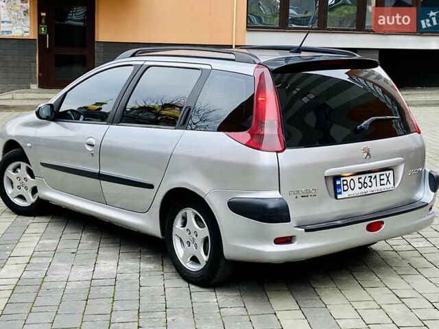 Серый Пежо 206, объемом двигателя 1.4 л и пробегом 260 тыс. км за 2850 $, фото 7 на Automoto.ua