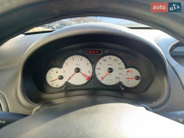 Сірий Пежо 206, об'ємом двигуна 1.36 л та пробігом 264 тис. км за 3400 $, фото 1 на Automoto.ua