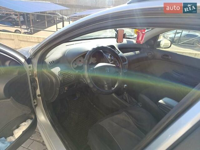 Сірий Пежо 206, об'ємом двигуна 1.36 л та пробігом 264 тис. км за 3400 $, фото 2 на Automoto.ua