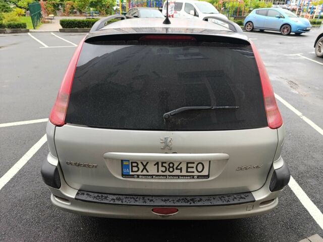 Серый Пежо 206, объемом двигателя 1.4 л и пробегом 270 тыс. км за 3350 $, фото 2 на Automoto.ua