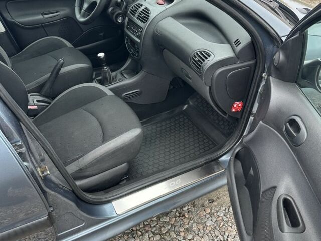 Серый Пежо 206, объемом двигателя 1.4 л и пробегом 209 тыс. км за 3700 $, фото 10 на Automoto.ua