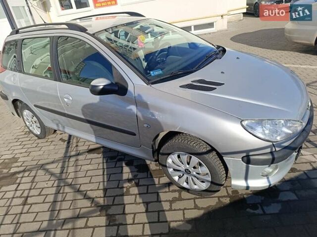 Сірий Пежо 206, об'ємом двигуна 1.36 л та пробігом 264 тис. км за 3400 $, фото 11 на Automoto.ua