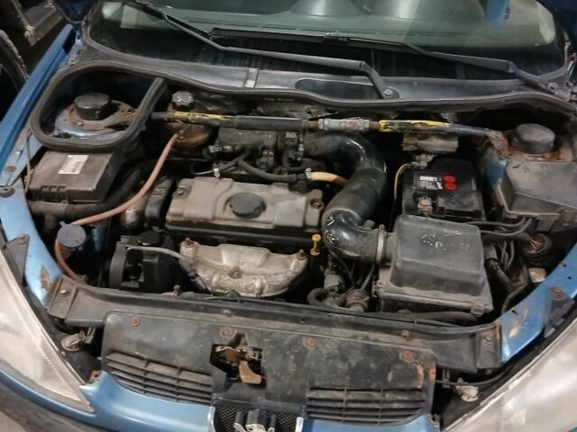 Синий Пежо 206, объемом двигателя 1 л и пробегом 230 тыс. км за 1000 $, фото 1 на Automoto.ua