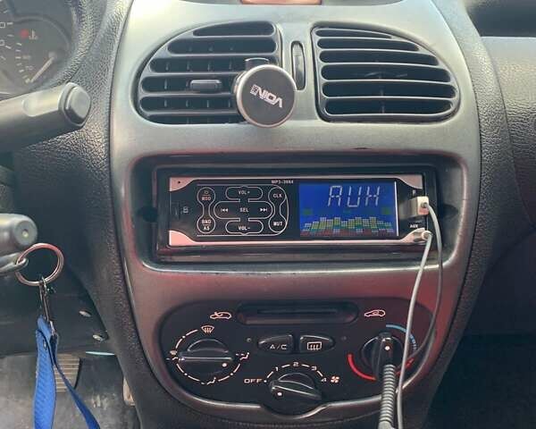 Синий Пежо 206, объемом двигателя 1.6 л и пробегом 300 тыс. км за 2300 $, фото 9 на Automoto.ua