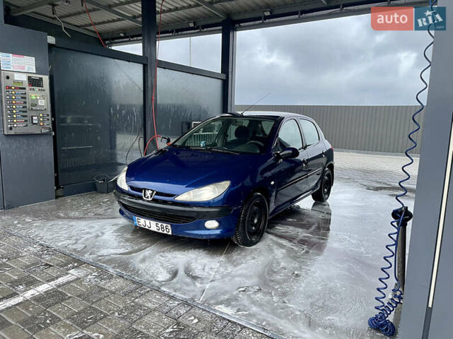 Синий Пежо 206, объемом двигателя 1.9 л и пробегом 400 тыс. км за 1300 $, фото 4 на Automoto.ua